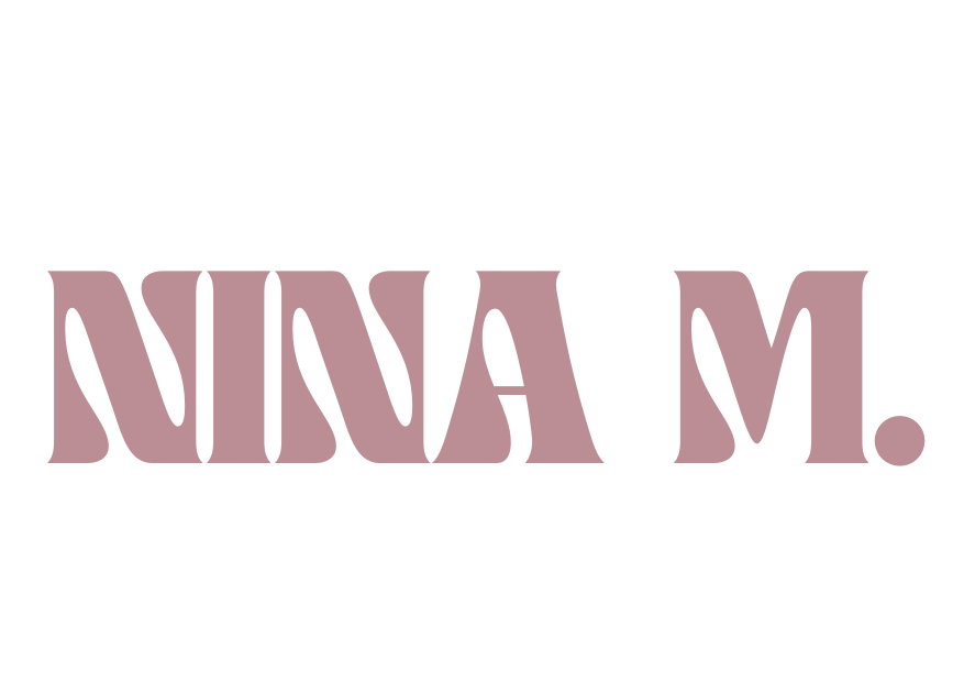 NINA M.